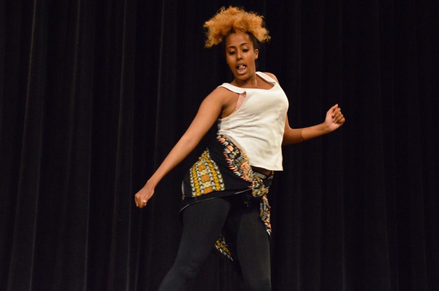 Junior Soubane Abdi performs an African dance at the Multicultural Show May 1.