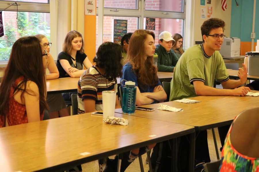 Seniors gather at one table at the last meeting of the year to reflect on Natural Helpers. 