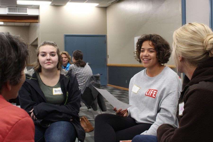 Juniors Izzy Kanne and Zoe Younger participate in a community discussion led by the Community Education Advisory Council Oct. 11 at the Rec Center. As members of SOAR, they attended this event to discuss racial issues in St. Louis Park.