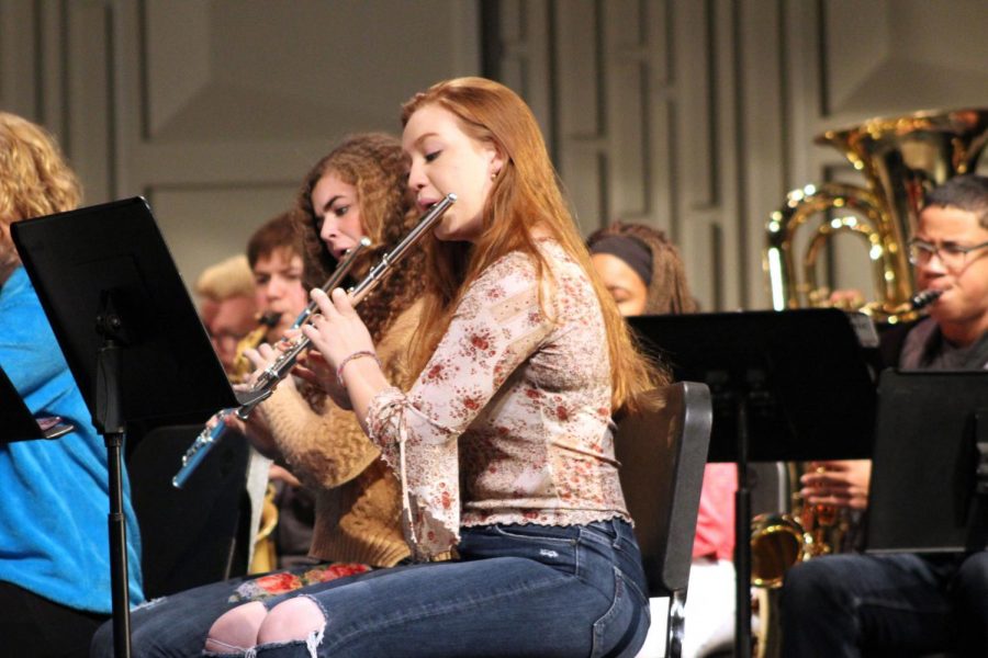 Senior Ana Armbrecht plays the flute at the joint band and Park Singers practice Nov. 28. The combined group will perform at the band concert Dec. 3.