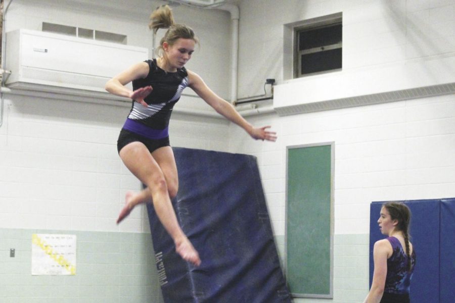Sophomore Maddie Olsen practices beam for Sections Feb. 16. Park is currently ranked No. 5 in 6A Sections. 