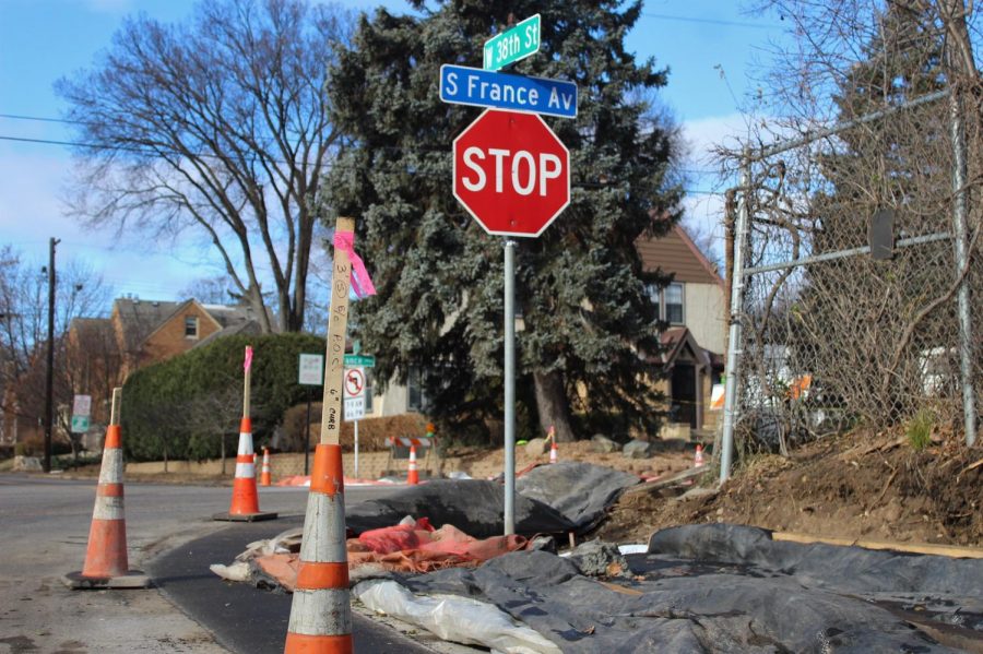 Construction on S France Ave causes temporary inconvenience for drivers.  The construction will make the intersection safe by constructing a crosswalk.