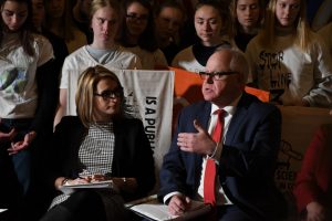 Minnesota Governor Tim Walz speaks to a room filled with students. Walz and Lutinnent Governor Flanagan addressed climate change and the policies in which they wish to enact throughout their term. 