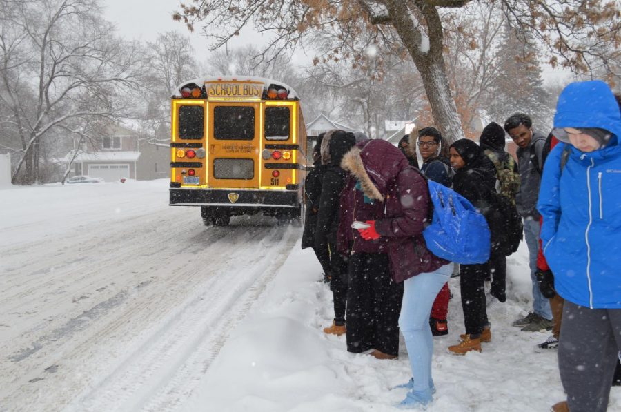 Students wait outside for their school bus after the early dismissal at 2:10 p.m. Feb. 7. St. Louis Park Public Schools will be closed Feb. 20 due to the forecasted snowstorm.