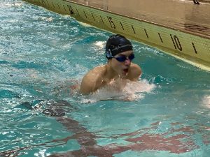 Freshman Harris Keekley recovers after swimming at the Bloomington Jefferson meet Feb. 5. Park boys swimming beat Jefferson 102-74. 