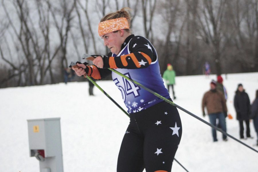 Sophomore Ivy Houts races in a Nordic Ski race Dec. 13 at Hyland Park. Girls Nordic Ski finished the season as conference champions, and Boys Nordic Ski finished third in the Metro West conference.