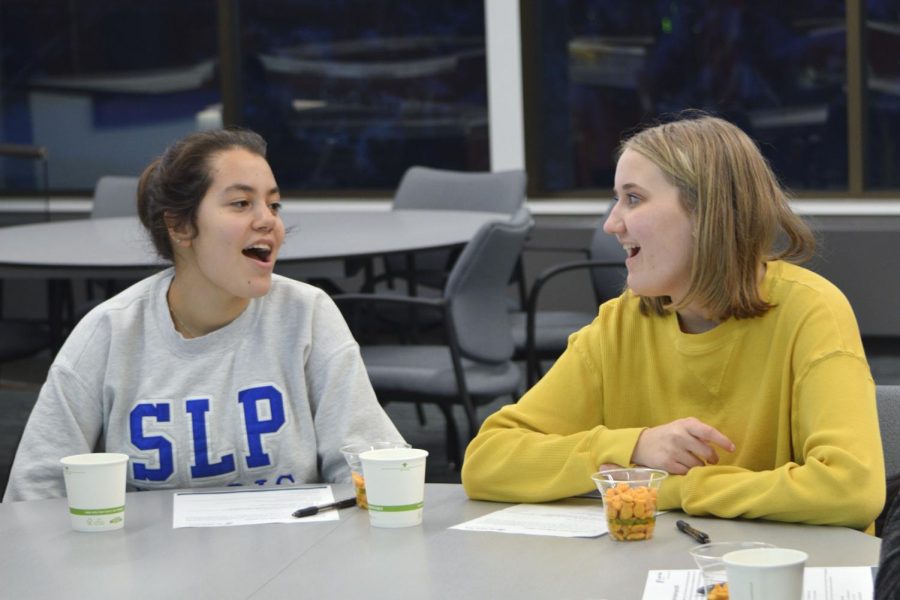 Juniors Maggie Klein and Amelia Ryan attend the Student Election Program meeting Feb. 12 at St. Louis Park City Hall. According to election specialist Robert Stokka, the program will have several meetings to explore different civic engagement topics.