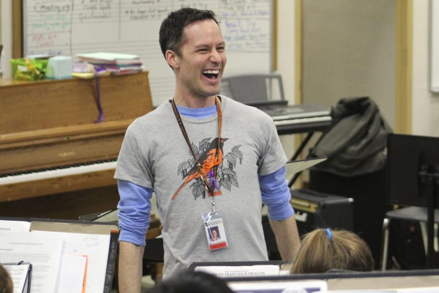 Band teacher Steve Schmitz enjoys time during class conducting his students. Schmitz was nominated for teacher of the year. Results will be announced May 5 at the St. Paul River Center. 