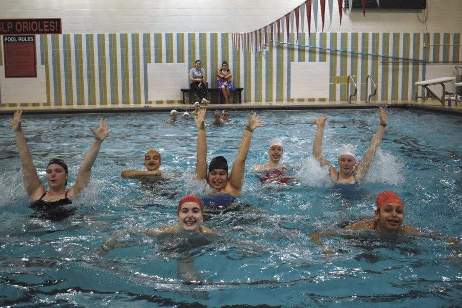Sophomores Maya Lee and Bella Stewart and team practice one of their routines at the middle school Feb. 2. Synchronized swimming is unable to practice at the high school due to construction around the locker rooms.