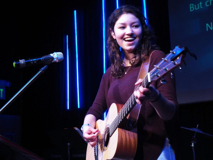 Junior Victoria Contreras plays guitar and sings during worship at Edebrook Church March 20. Contreras performsAmazing Grace along with two other songs for her youth group every few Wednesdays.
