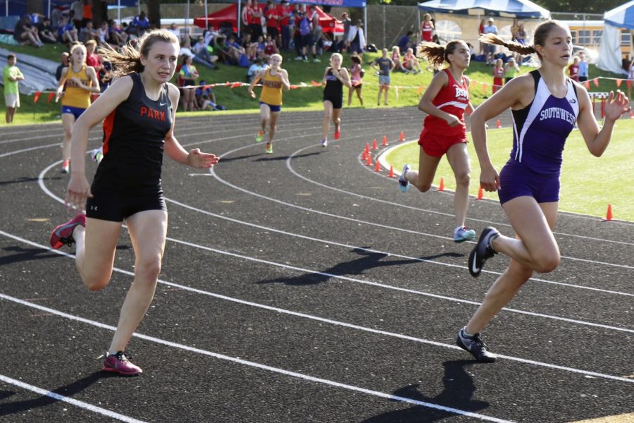 Senior Anna Jenissen races the 200m during the 2018 track and field season. 