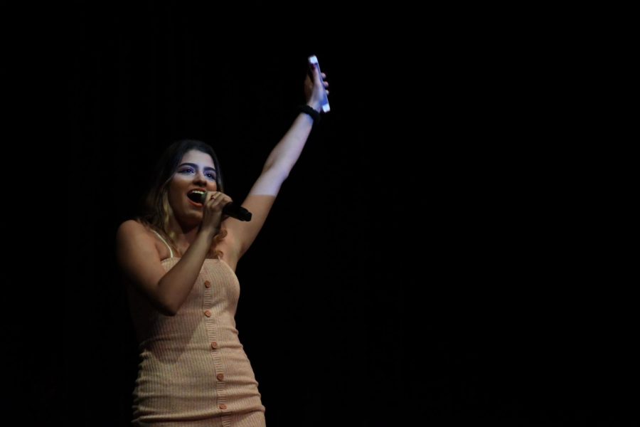 Senior Andreina Rodriguez sings “Vivir Mi Vida” by Marc Anthony. Rodriguez sang alongside fellow senior Cecelia Brown. 