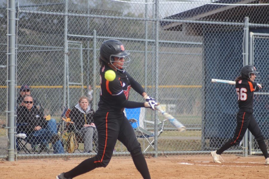 Senior Madison Mclntosh attempts to hit the ball in a game against Bloomington Kennedy on April 18. The game ended in a 1-5 Park loss.