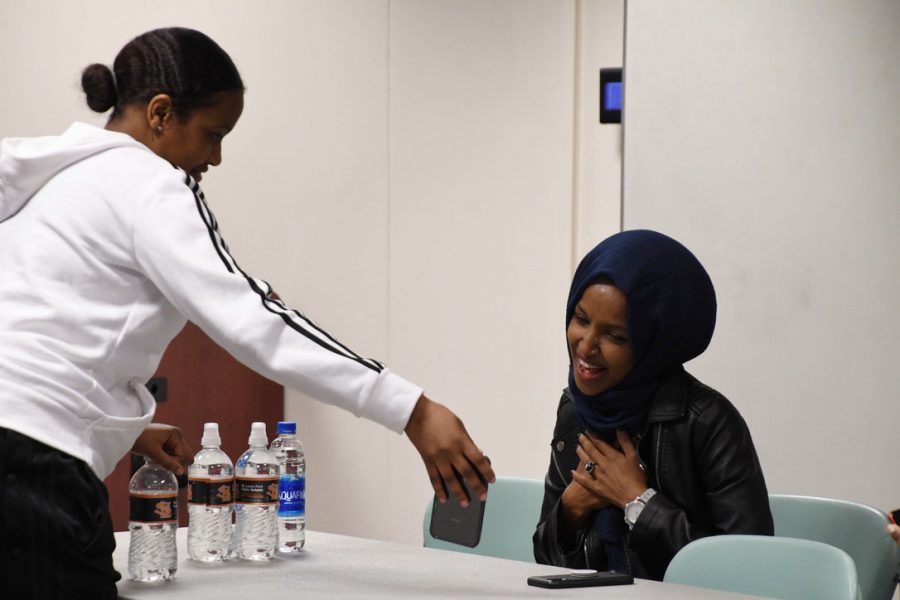 Prior to Rep. Ilhan Omar addressing the room about her experience as an immigrant and congresswomen, sophomore Abyan Moge excitedly called her mother on FaceTime and introduced her mother to Ilhan Omar. 