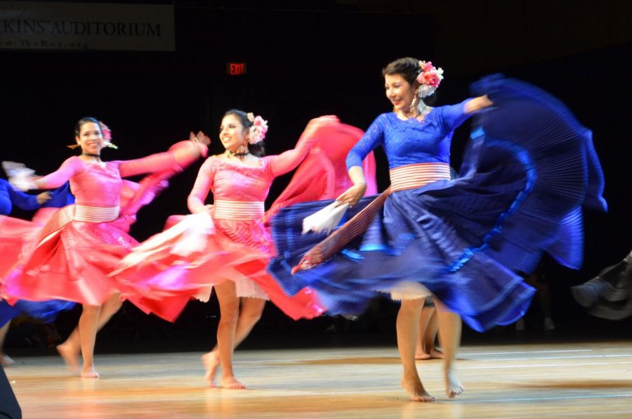 Spanish teacher Hanna Anderson performs the Marinera with her dance group Mí Peru - Minnesota May 5 at the Festival of Nations. The Marinera is a Peruvian coastal dance that incorporates the use of handkerchiefs and is usually performed with partners. 