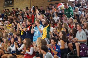 The senior class stands and cheers with excitement at the first day of school Pep fest Sept. 3. The class wore jerseys to show their senior pride.