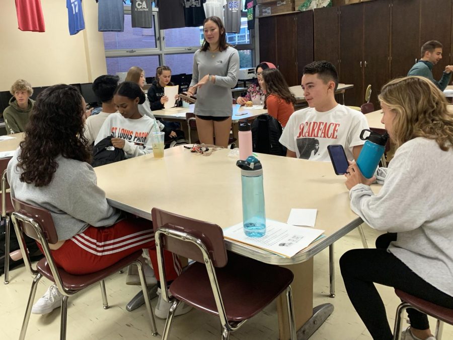 Junior Emma Amon leading group activity for a mock interview. This is the first informational meeting regarding DECAs fundraising and field trips of the year.