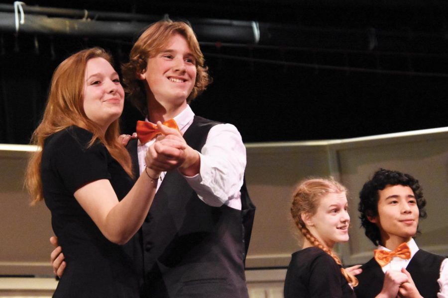 Junior Casey Hunter dances with freshman Isaiah Klepfer during their performance of Slow Dancing in the Snow. This mix of song and dance was performed by the Park Singers. According to the events program, Park Singers has 20 singers. 