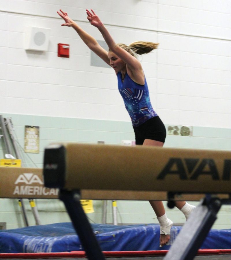Sophomore Ryan Rasmussen prepares to complete a tumbling pass at gymnastics practice Nov. 25. The gymnastics team’s first meet is at 11 a.m. Dec. 7 at White Bear Lake Area High School.