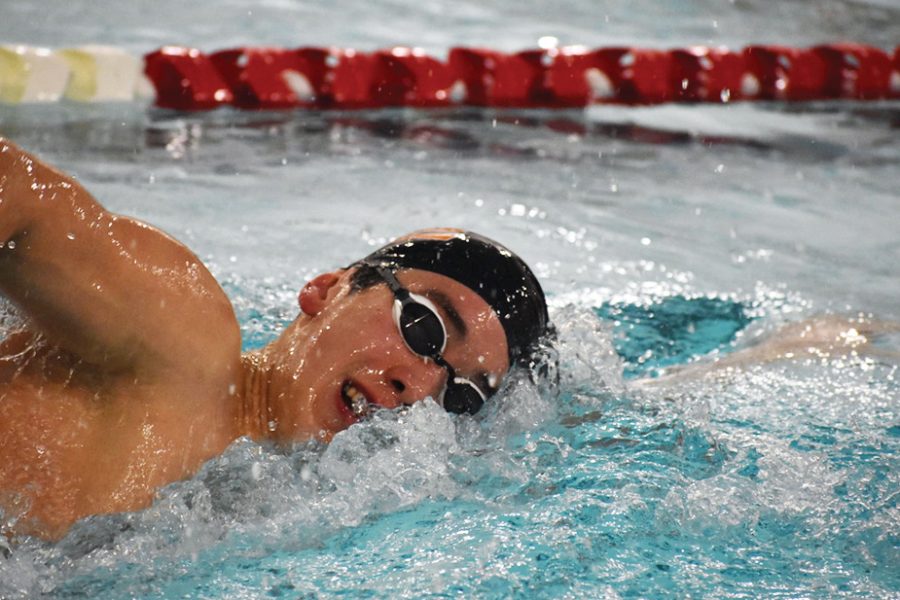 Junior Hayden Zheng wins the 500-yard freestyle against Benilde-St. Margarets Dec. 19. Zheng will compete for the high school team for the rest of the winter season after attending the Junior Nationals meet outside Seattle, Washington. 
