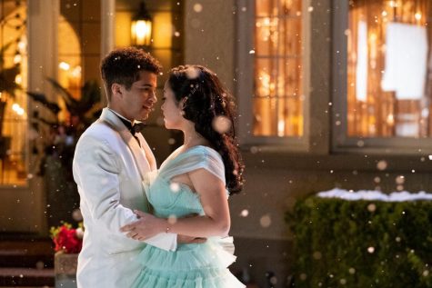 Fair use from Netflix: John Ambrose (Jordan Fisher) holds Lara Jean Covey (Lana Condor) as they greet each other before the dance. To All the Boys: P.S. I Still Love You came out on Netflix Feb. 12.