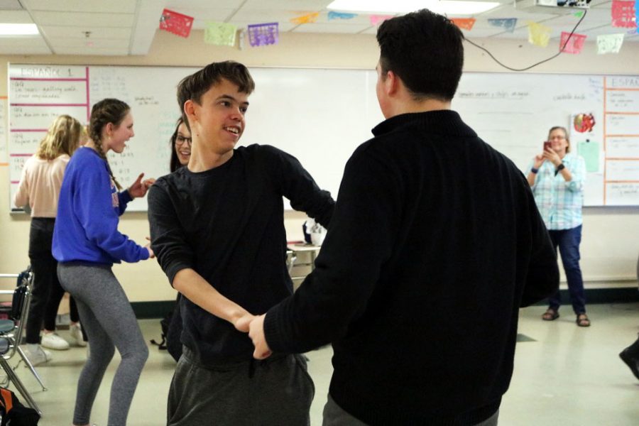 Juniors Isaac Scott and Justin Colon dance together at the Spanish club Feb. 12th. The meeting was focused around different Latin American music and dancing.