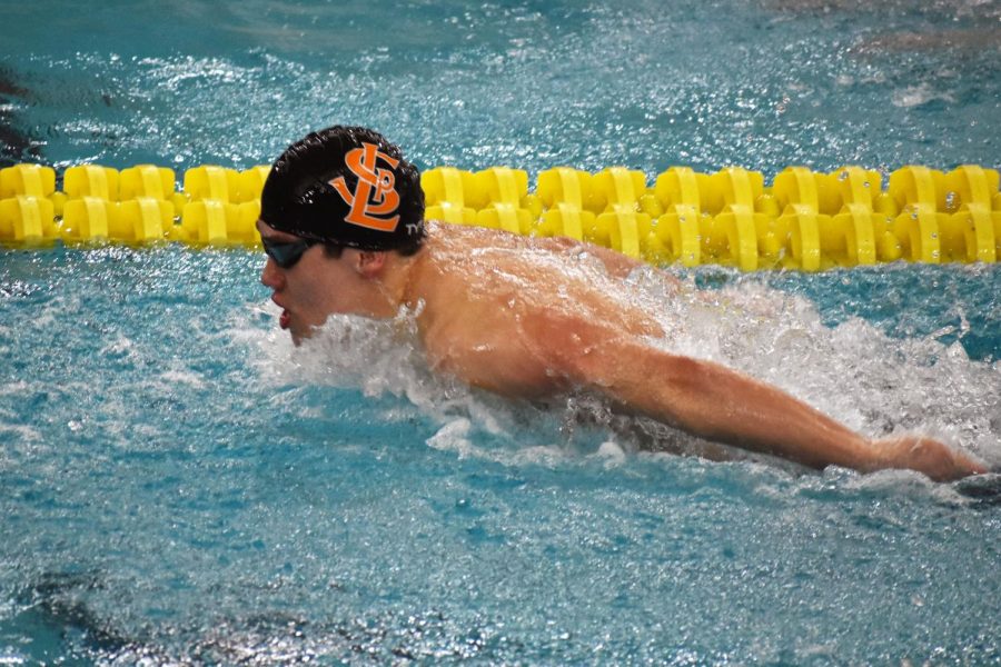 Junior Hayden Zheng swims the 200-yard individual medley during the boys swimming State meet Feb. 29. Zheng won the event with a time of 1:47.75.