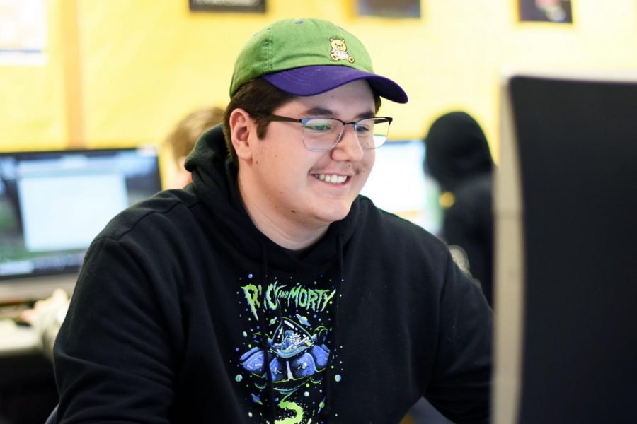 Junior Angel Diaz smiles during the eSports meeting March 5. According to coach Jake Utities, the meeting was in preparation for the eSports spring season.