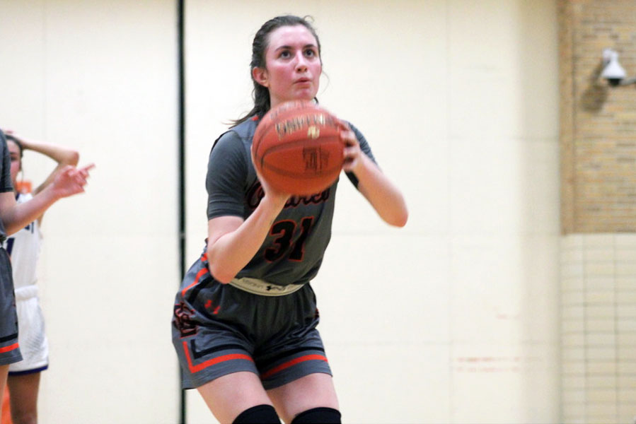 Senior Shayla Miller takes a shot at the basket at girls basketballs first Section game Feb. 26. The girls basketball season came to a close Feb. 29 when Park lost to Wayzata 64-71.
