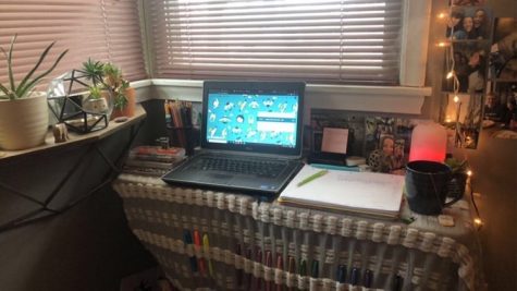 Photo used with permission from junior Marissa Boettcher. “This is my setup. I don’t have a desk in my room so I had to get creative. I used two TV trays (idk what they’re called) and put a cute blanket over it. I also decorated with some accessories so that my work space wouldn’t be bland,” Boettcher said. To submit your digital learning set up, send a picture and a few sentences about how digital learning is going to slpecho on Instagram. 