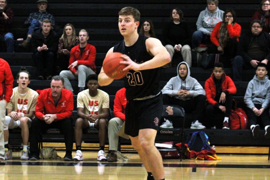 Senior Aaron Ellingson passes the ball in a game Dec. 10 against Henry Sibley. Ellingson was named one of 28 recipients of the All-American Award.