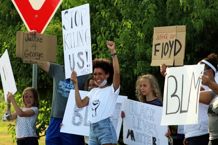 A group of young protesters protest racial injustice and police brutality at a family-friendly protest June 25. Protesters gathered from 5-6:30 p.m. at the France Ave. bridge over Hwy 62.