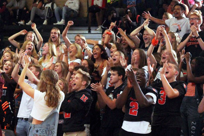 Seniors cheer at the Homecoming Pep fest Sept. 20. The Pep fest included a teacher versus Homecoming court volleyball game.