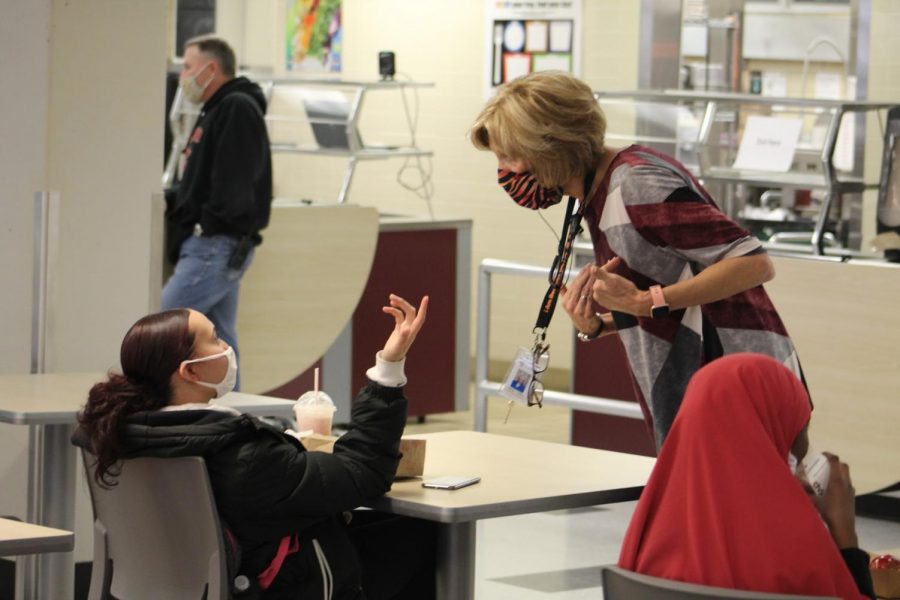 Interim Principal Wendy Loberg talks to a student during lunch Oct. 26. Park began a hybrid model at 25% capacity Oct. 26.