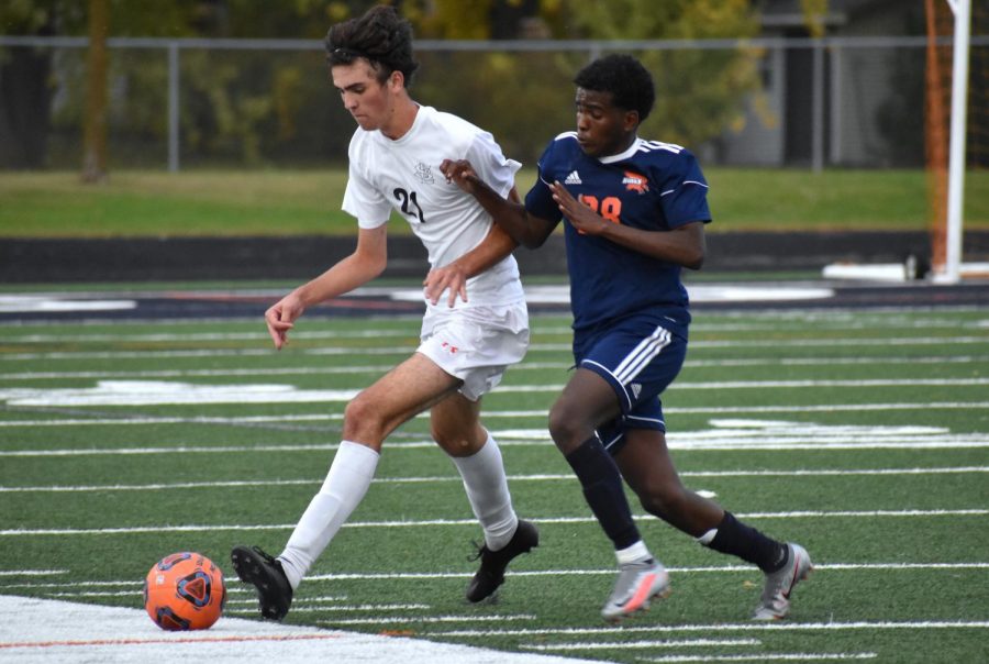 Junior Nick Kent maneuvers the ball in one of Parks soccer games. Boys soccer lost 1-0 in the second round of sections.