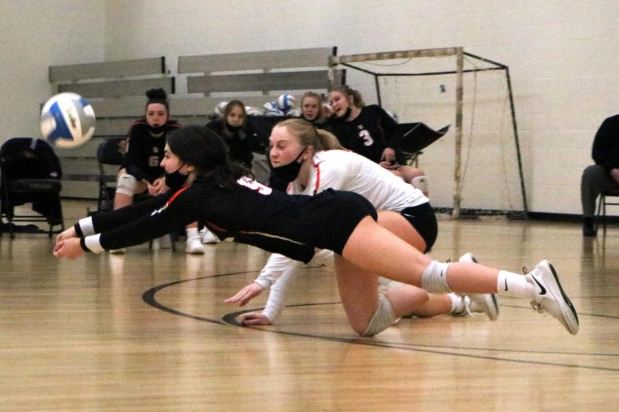Junior Elsa Bergland dives for the ball in a game against Robbinsdale Cooper Oct. 27. Park won with a final set score of 3-0.
