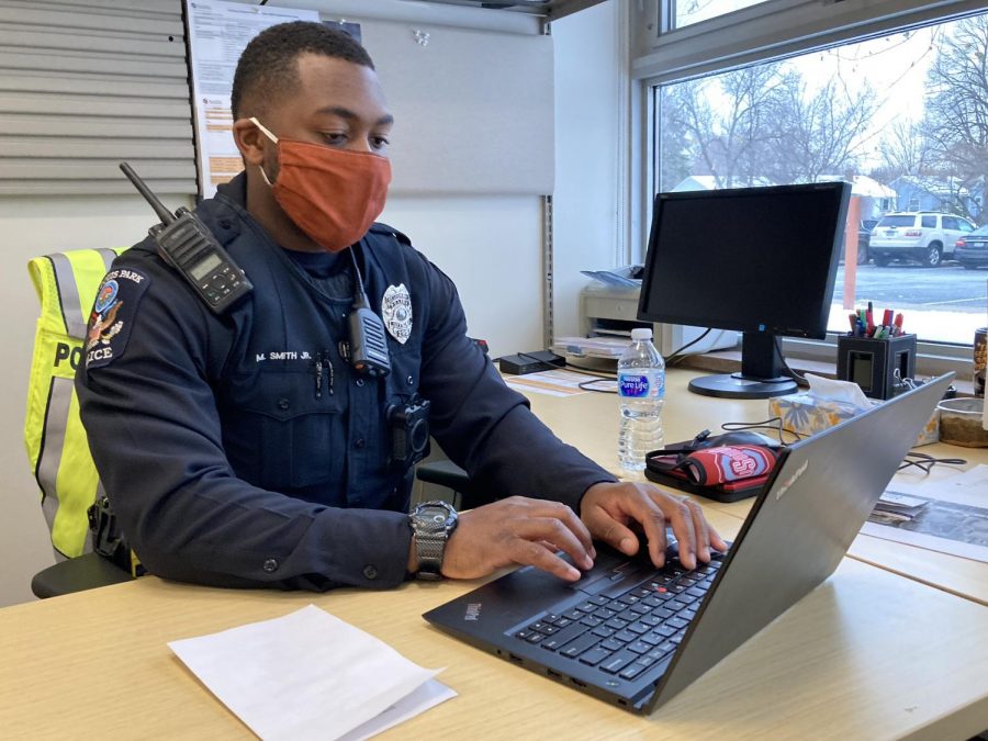 School resource officer Maurice Smith types on his laptop in his office at Park. Smith applied due to his passion for working with kids and began his new role for the 2020-21 school year.