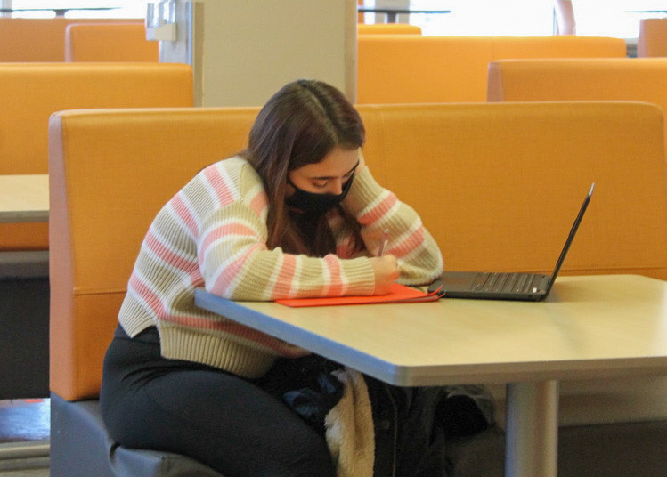 Freshman Kate Lemen uses the Oriole Study Nest Feb. 12 to work on her assignments during distance learning. Grades 9-12 will return to hybrid at 50 percent capacity starting Feb. 22. 