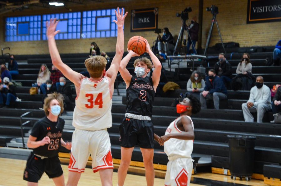 Junior Henry Odens goes for a contested shot in the game Feb. 5. Park lost to Benilde 65-47.