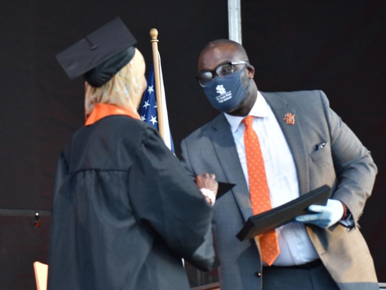 Superintendent Astein Osei congratulates students during graduation June 6. Osei will be conducting a search to find Park’s new principal.
