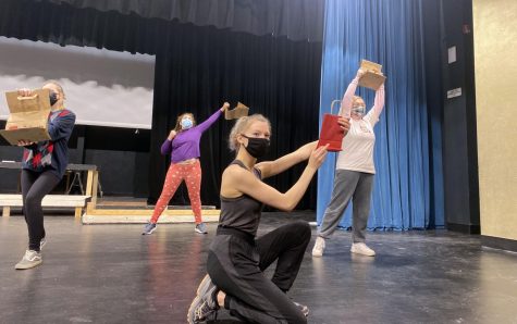 Junior Renee McSherry poses during rehearsal for the spring musical March 12. The cast was practicing the dance for the song “Delivery.”