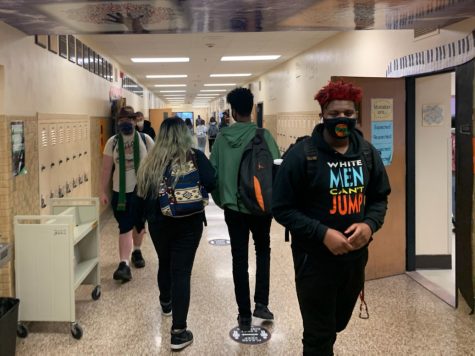 Students walk in the hallway to class April 9. Many students are now eligible to get the vaccine after Gov. Walz expanded vaccine eligibility to all 16-year-olds March 30.