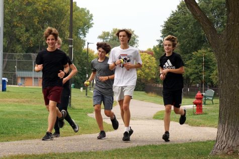 Varsity runners run during practice Sept. 29. The cross country team will face St. Michaels at 4 p.m. Oct. 4 at St. Michael Recreation Center. 