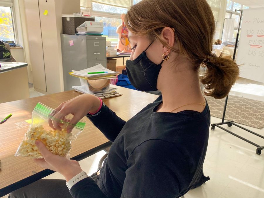 Sophomore Rylie Unangst eats during class Nov. 2. Eating food in classrooms is prohibited due to COVID-19.