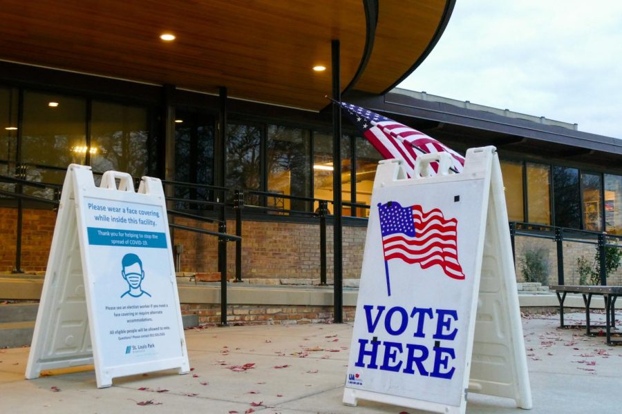 Signs direct voters to wear masks at Westwood Church Nov 2. Voters cast their ballots in school board and City Council races.