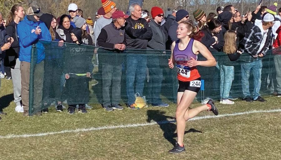 Freshman Nora Lindeman runs at the state meet on Nov. 6. Lindeman finished in 104th place at the MSHL state meet.