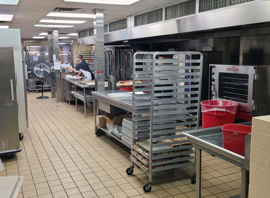 Kitchen Staff prepares school lunch Dec. 6. Planned kitchen renovations were canceled due to lack of funds.