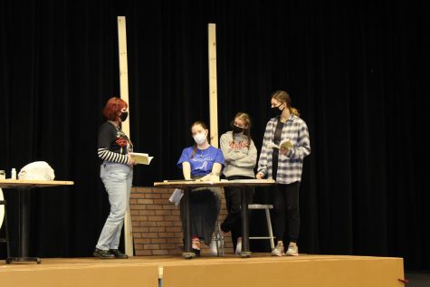 Seniors Caroline Butler and Louise Marshall, and juniors Gwen Rocker-Gladen and Abby Baudhin rehearse for the Winter One Act “These Shining Lives” where they play workers plagued with radium poisoning. The show is opening Jan. 14 and closing Jan. 16.
