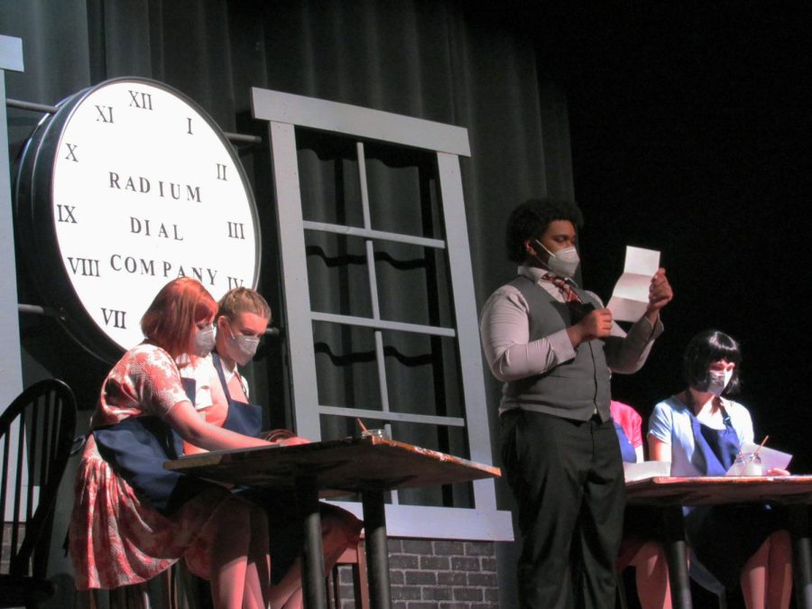 Juniors Gwen Rockler-Gladen and Abby Baudhuin, freshman Isaiah Brown and senior
 Louise Marshall act on stage Jan. 16. “These Shining Lives” opened Jan. 14 and closed Jan. 16.