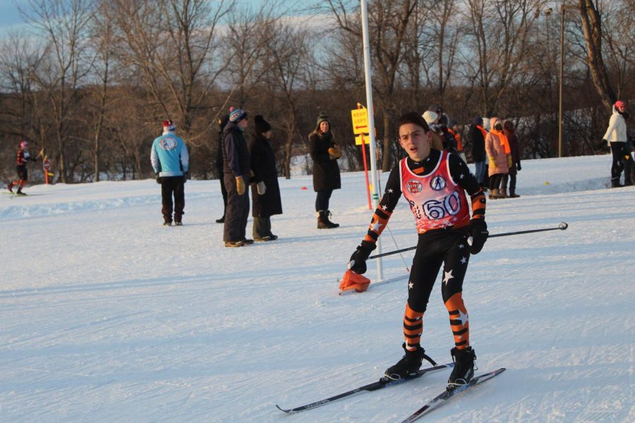 Freshman Lucas Tangelson crosses the finish line Jan. 11 at the Metro West conference. Park won three of its four races.